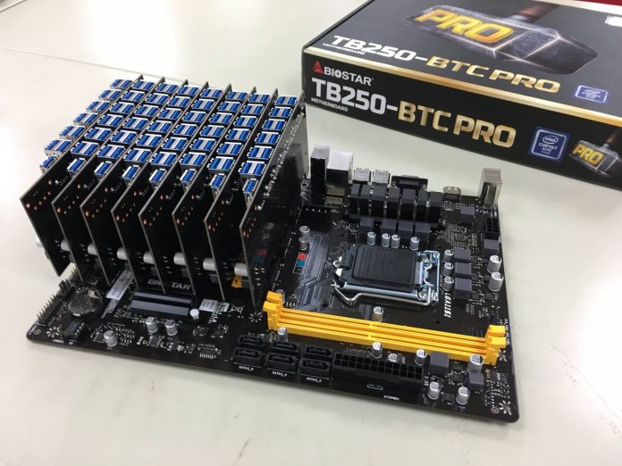 biostar-mining-motherboard-104-gc-1big Biostar показа система с възможност за включване на 100 видеокарти