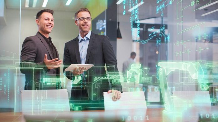 Two businessmen with tablet in office boardroom Siemens и Aruba, част от Hewlett Packard Enterprise, сформират стратегическо партньорство за интегрирани мрежи